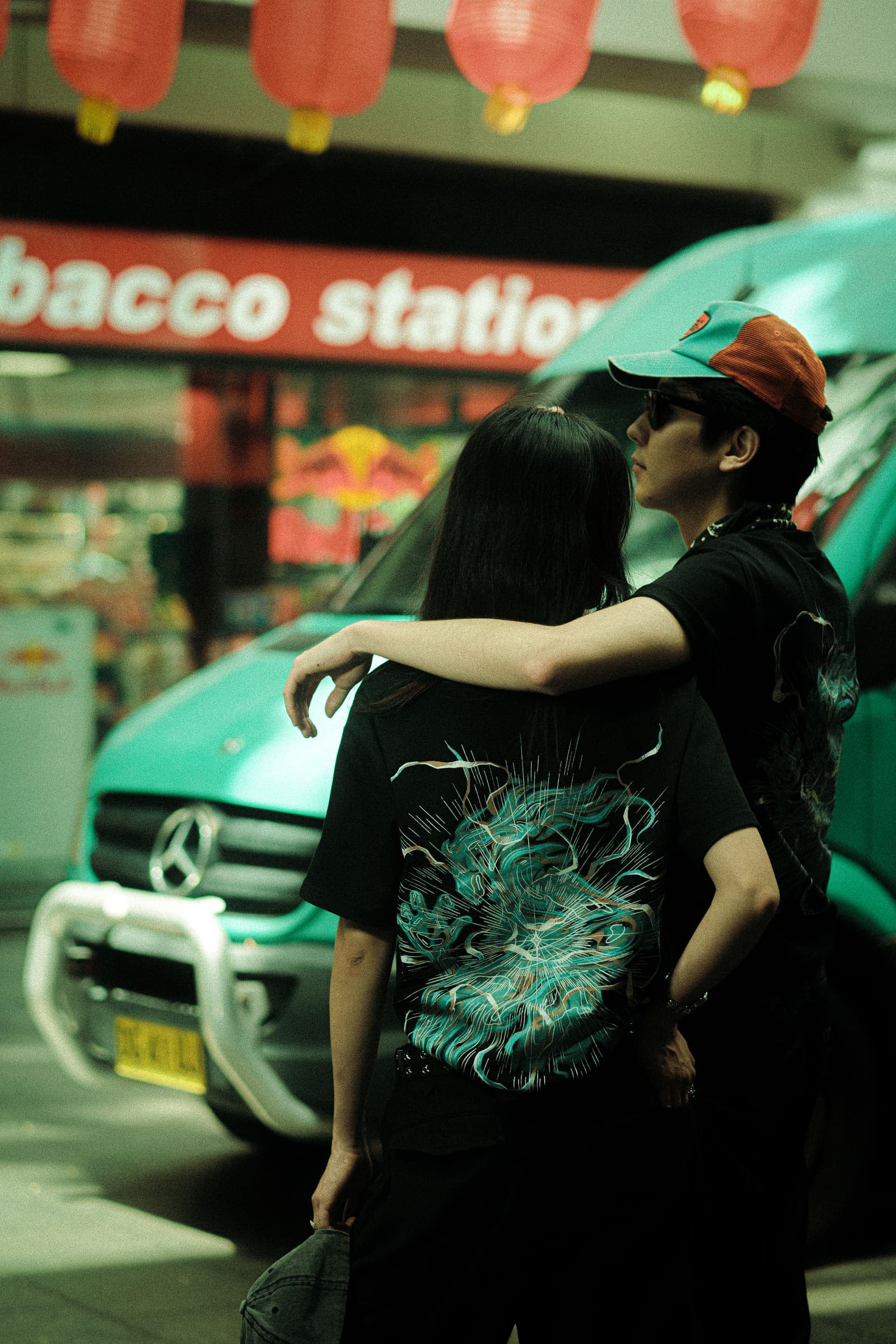 A third take of the back print by the van